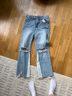 Women's Light Blue Distressed Button-Fly Jeans